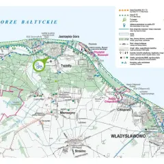 Mapa turystyczna z zaznaczoną trasą rowerową Jastrzębia Góra Dębki, prowadzącą przez Karwię, Ostrowo i Władysławowo, wzdłuż Morza Bałtyckiego.