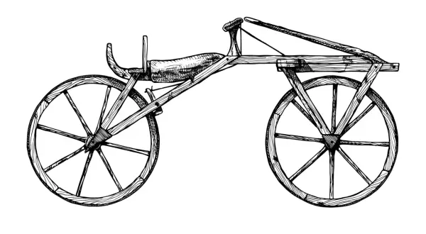 Drewniany pojazd z dwoma kołami, siodełkiem i kierownicą. Ilustracja pokazuje, jak powstał rower, czyli jego pierwotna, prymitywna forma.