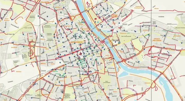 Mapa tras rowerowych Warszawy. Czerwone linie pokazują ścieżki rowerowe, a niebieskie punkty to stacje Veturilo.