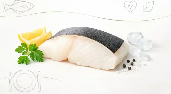 Świeży filet ryby z cytryną i ziołami. Czy halibut jest zdrowy? Tak, to doskonały wybór dla serca i diety.