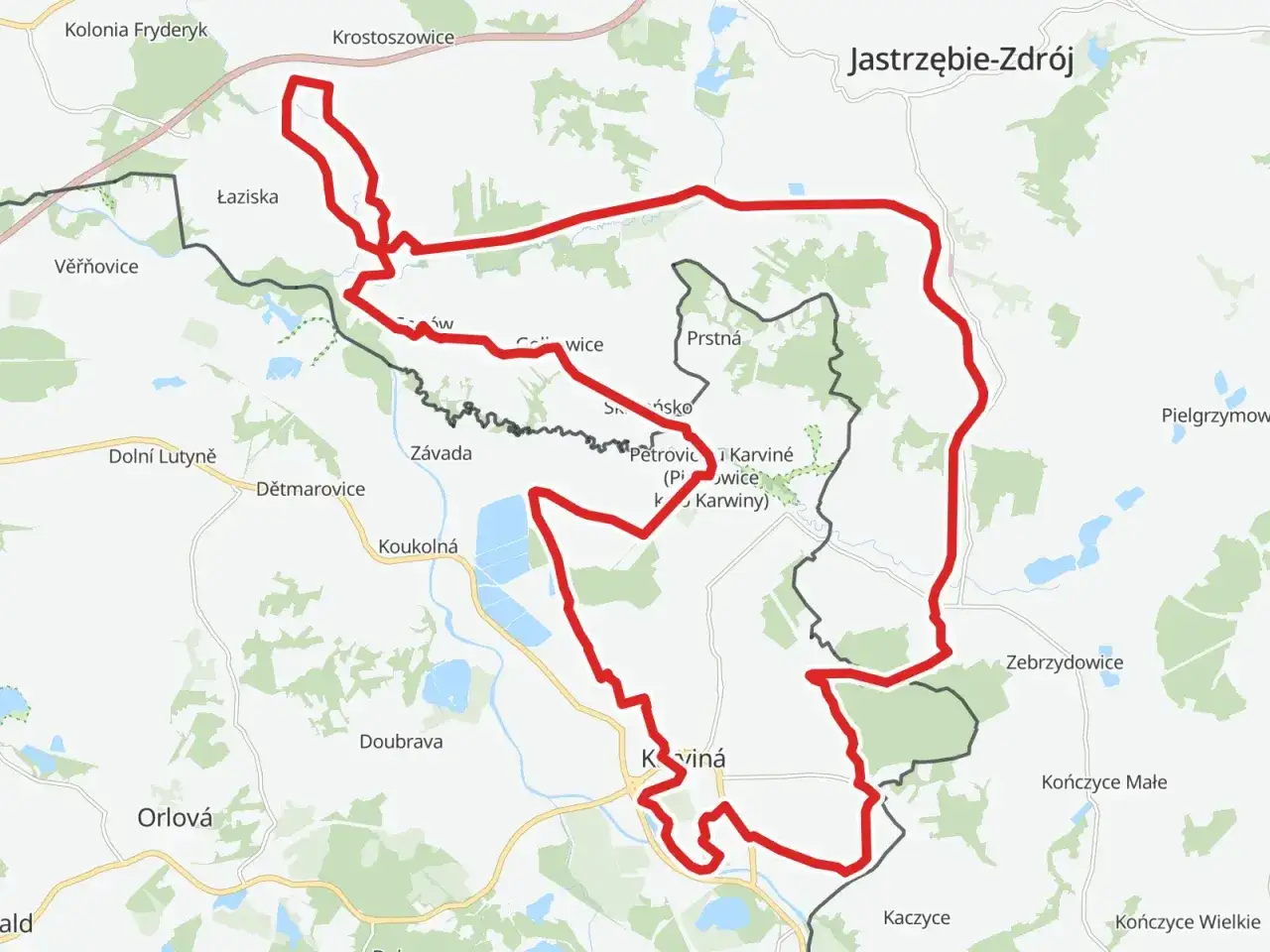 Mapa wyznaczająca żelazny szlak rowerowy, prowadzący przez tereny zurbanizowane i zielone, z zaznaczonymi miejscowościami jak Jastrzębie-Zdrój, Karviná i Orlová.
