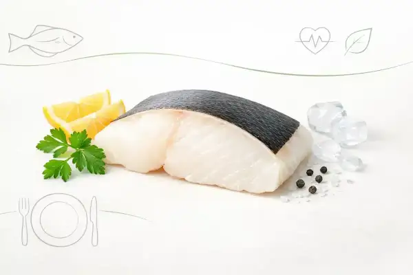 Świeży filet ryby z cytryną i ziołami. Czy halibut jest zdrowy? Tak, to doskonały wybór dla serca i diety.